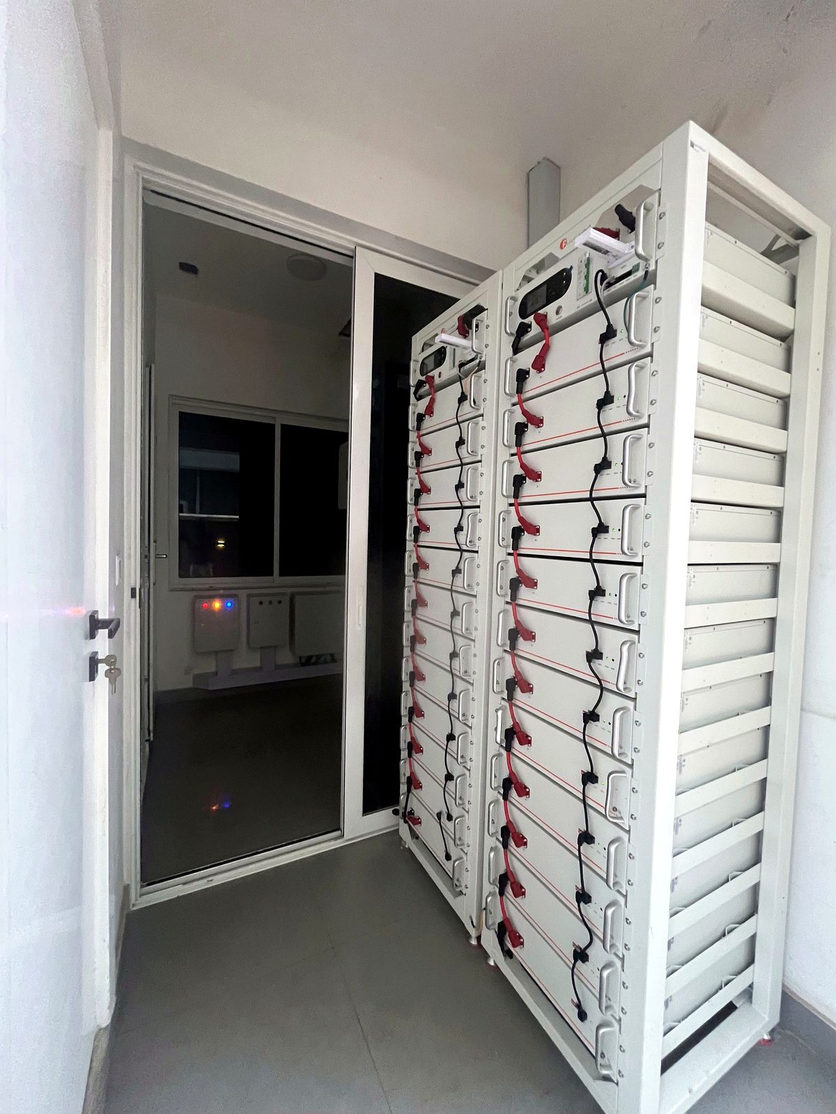 Battery storage racks in a solar hybrid power room